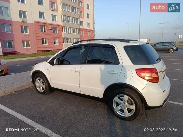Білий Сузукі СХ4, об'ємом двигуна 1.59 л та пробігом 125 тис. км за 9459 $, фото 10 на Automoto.ua