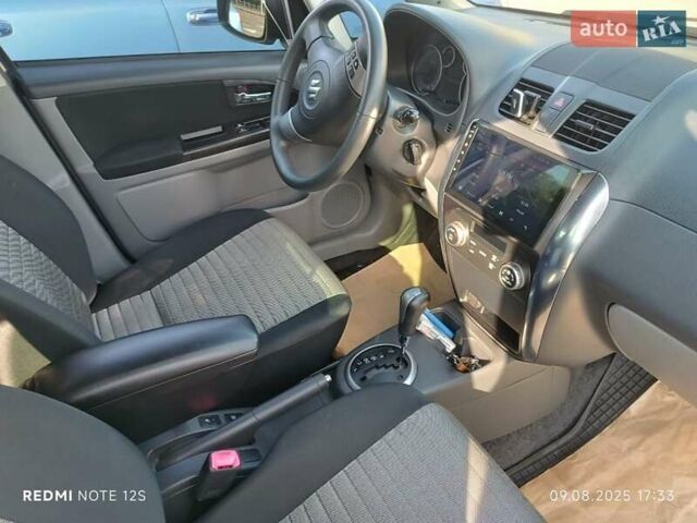 Білий Сузукі СХ4, об'ємом двигуна 1.59 л та пробігом 125 тис. км за 9459 $, фото 9 на Automoto.ua