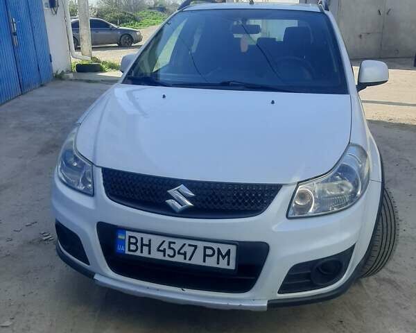 Белый Сузуки СХ4, объемом двигателя 1.6 л и пробегом 250 тыс. км за 6000 $, фото 7 на Automoto.ua