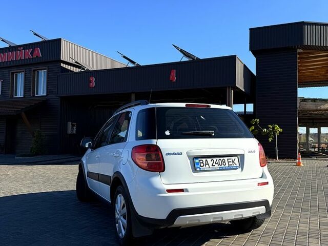 Белый Сузуки СХ4, объемом двигателя 1.6 л и пробегом 125 тыс. км за 9500 $, фото 2 на Automoto.ua