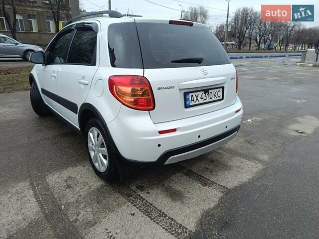 Белый Сузуки СХ4, объемом двигателя 1.59 л и пробегом 113 тыс. км за 8800 $, фото 2 на Automoto.ua