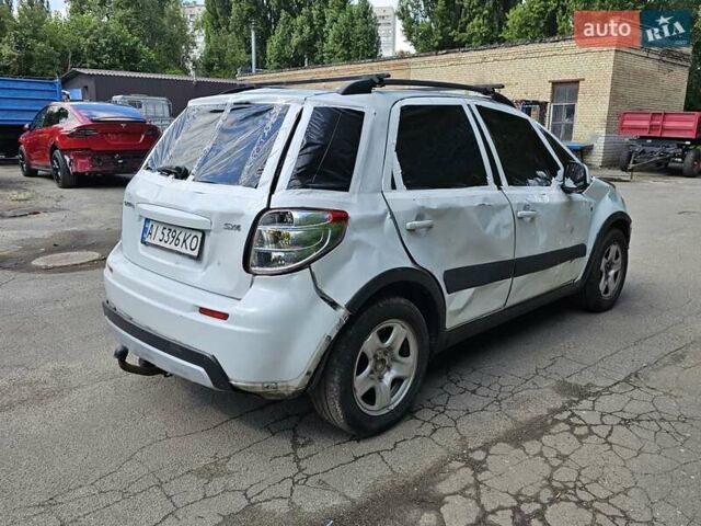 Белый Сузуки СХ4, объемом двигателя 1.59 л и пробегом 100 тыс. км за 3800 $, фото 8 на Automoto.ua