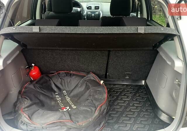 Белый Сузуки СХ4, объемом двигателя 1.6 л и пробегом 98 тыс. км за 11000 $, фото 5 на Automoto.ua