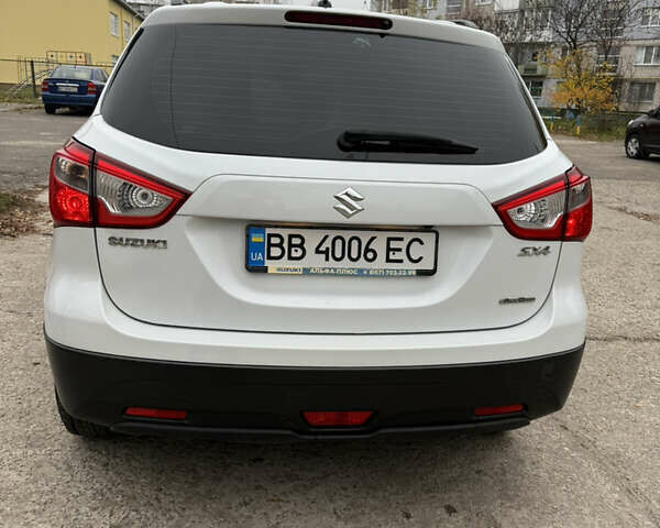 Белый Сузуки СХ4, объемом двигателя 1.59 л и пробегом 141 тыс. км за 11800 $, фото 1 на Automoto.ua