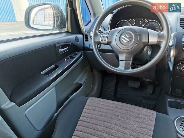Белый Сузуки СХ4, объемом двигателя 1.6 л и пробегом 125 тыс. км за 9900 $, фото 16 на Automoto.ua