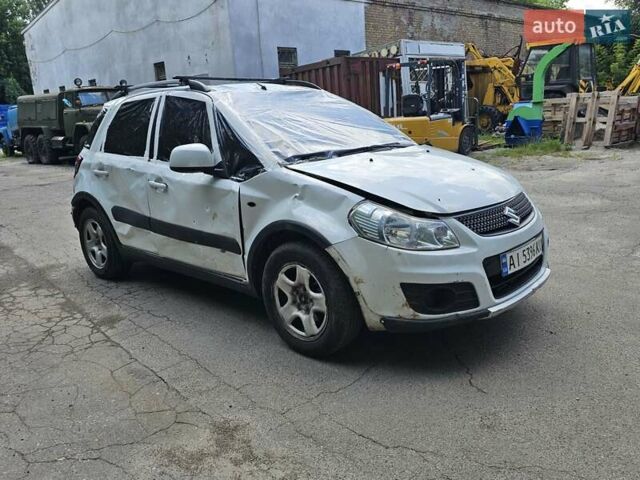 Белый Сузуки СХ4, объемом двигателя 1.59 л и пробегом 100 тыс. км за 3800 $, фото 4 на Automoto.ua