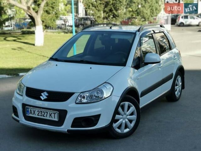 Белый Сузуки СХ4, объемом двигателя 1.6 л и пробегом 125 тыс. км за 9900 $, фото 1 на Automoto.ua