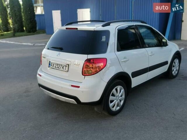 Белый Сузуки СХ4, объемом двигателя 1.6 л и пробегом 125 тыс. км за 9900 $, фото 12 на Automoto.ua