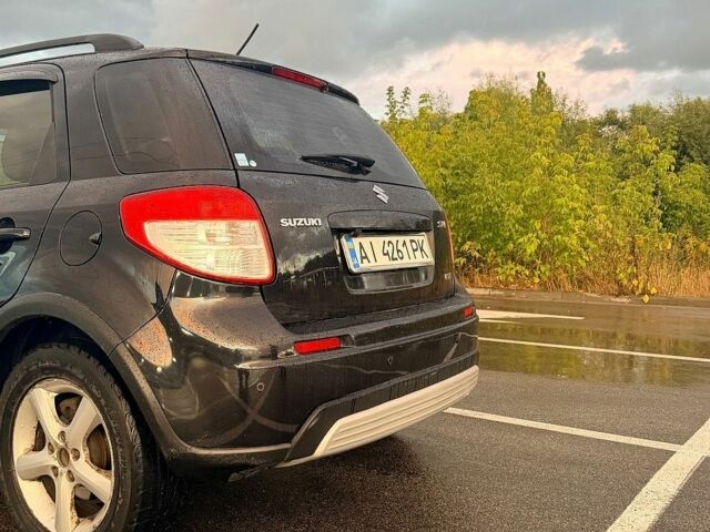 Чорний Сузукі СХ4, об'ємом двигуна 2 л та пробігом 217 тис. км за 6800 $, фото 8 на Automoto.ua