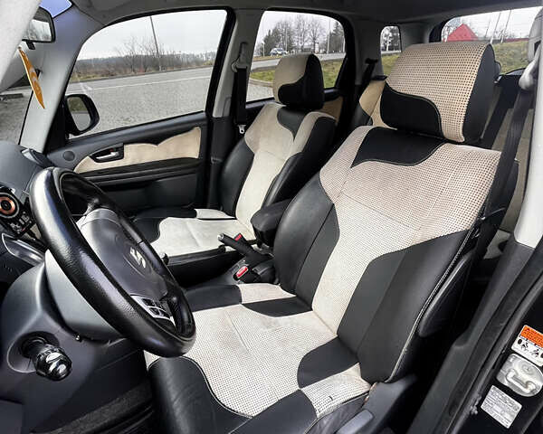 Чорний Сузукі СХ4, об'ємом двигуна 1.6 л та пробігом 315 тис. км за 5500 $, фото 20 на Automoto.ua