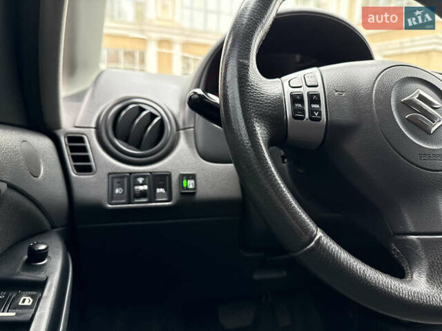 Чорний Сузукі СХ4, об'ємом двигуна 2 л та пробігом 156 тис. км за 5900 $, фото 13 на Automoto.ua