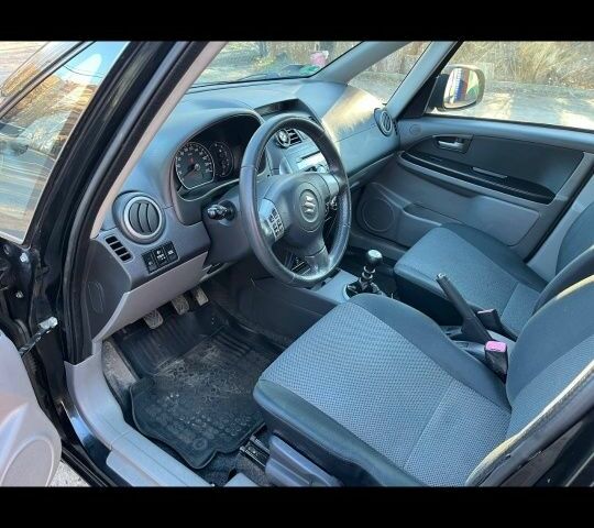 Черный Сузуки СХ4, объемом двигателя 1.9 л и пробегом 198 тыс. км за 5150 $, фото 5 на Automoto.ua