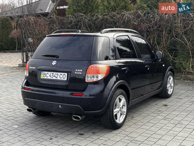 Чорний Сузукі СХ4, об'ємом двигуна 1.6 л та пробігом 315 тис. км за 5000 $, фото 8 на Automoto.ua