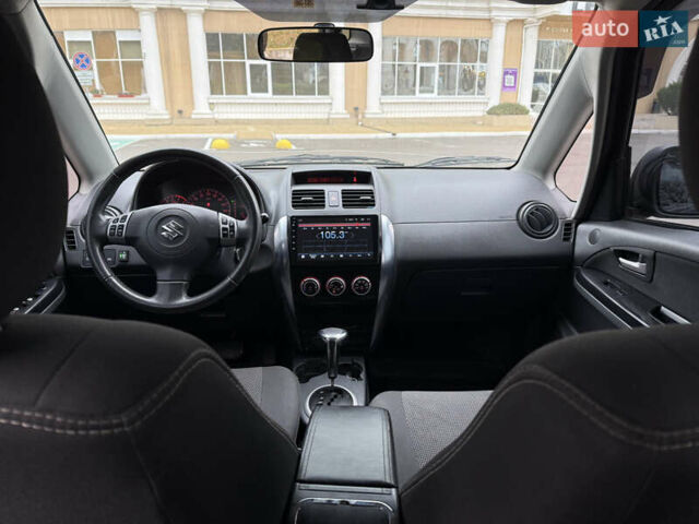 Чорний Сузукі СХ4, об'ємом двигуна 2 л та пробігом 156 тис. км за 5900 $, фото 11 на Automoto.ua