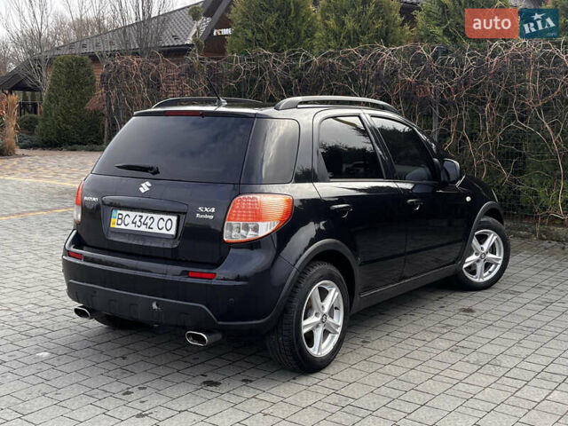 Чорний Сузукі СХ4, об'ємом двигуна 1.6 л та пробігом 315 тис. км за 5000 $, фото 7 на Automoto.ua