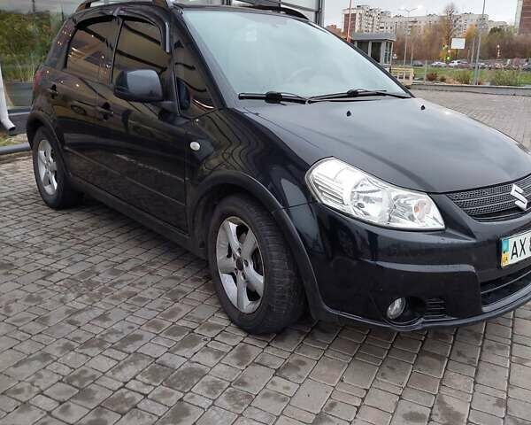 Черный Сузуки СХ4, объемом двигателя 1.6 л и пробегом 69 тыс. км за 8500 $, фото 1 на Automoto.ua