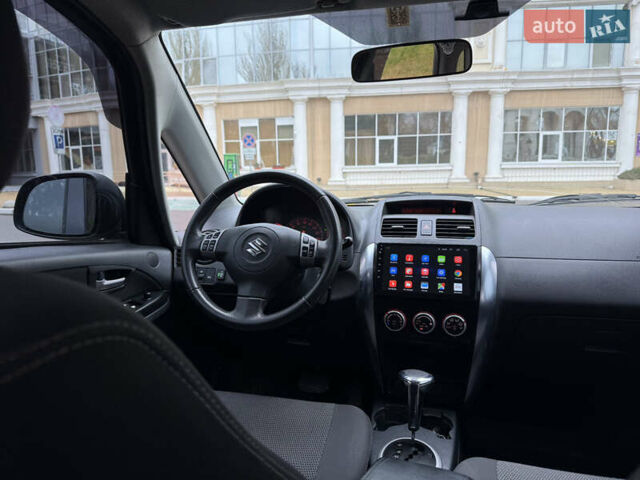 Чорний Сузукі СХ4, об'ємом двигуна 2 л та пробігом 156 тис. км за 5900 $, фото 12 на Automoto.ua