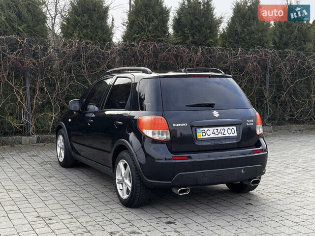 Чорний Сузукі СХ4, об'ємом двигуна 1.6 л та пробігом 315 тис. км за 5500 $, фото 8 на Automoto.ua