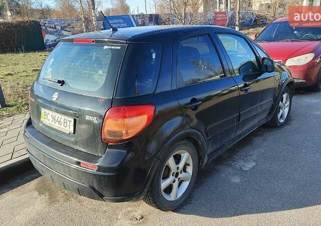 Черный Сузуки СХ4, объемом двигателя 1.6 л и пробегом 286 тыс. км за 3650 $, фото 1 на Automoto.ua