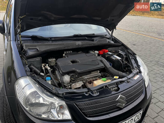Чорний Сузукі СХ4, об'ємом двигуна 1.6 л та пробігом 315 тис. км за 5500 $, фото 39 на Automoto.ua