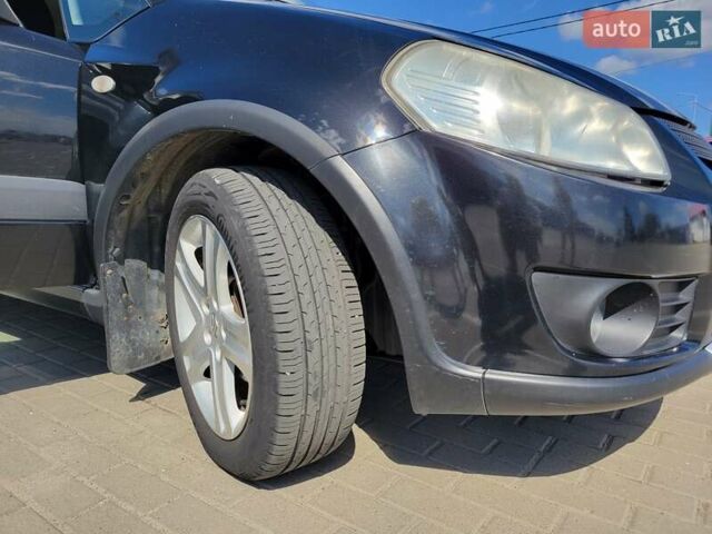 Черный Сузуки СХ4, объемом двигателя 1.6 л и пробегом 156 тыс. км за 6200 $, фото 30 на Automoto.ua