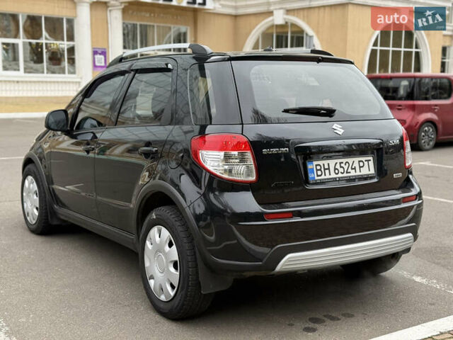 Чорний Сузукі СХ4, об'ємом двигуна 2 л та пробігом 156 тис. км за 5900 $, фото 7 на Automoto.ua