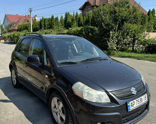Черный Сузуки СХ4, объемом двигателя 1.6 л и пробегом 230 тыс. км за 4800 $, фото 2 на Automoto.ua