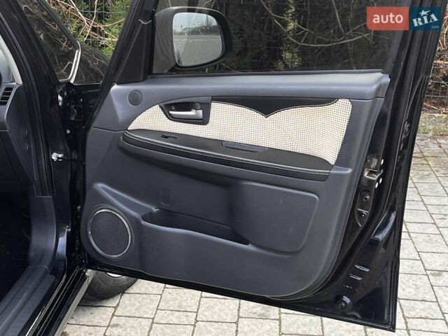 Чорний Сузукі СХ4, об'ємом двигуна 1.6 л та пробігом 315 тис. км за 5000 $, фото 18 на Automoto.ua