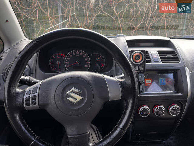 Чорний Сузукі СХ4, об'ємом двигуна 1.6 л та пробігом 315 тис. км за 5500 $, фото 23 на Automoto.ua