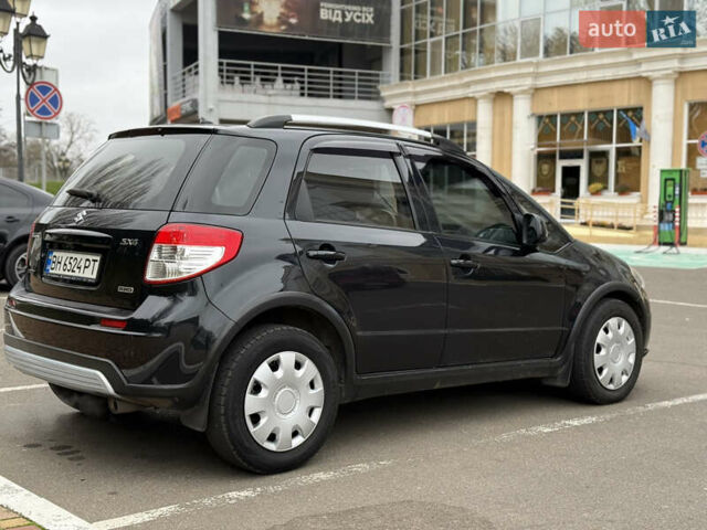 Чорний Сузукі СХ4, об'ємом двигуна 2 л та пробігом 156 тис. км за 5900 $, фото 9 на Automoto.ua
