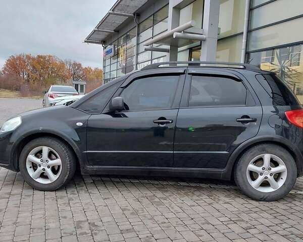 Черный Сузуки СХ4, объемом двигателя 1.6 л и пробегом 69 тыс. км за 8500 $, фото 3 на Automoto.ua