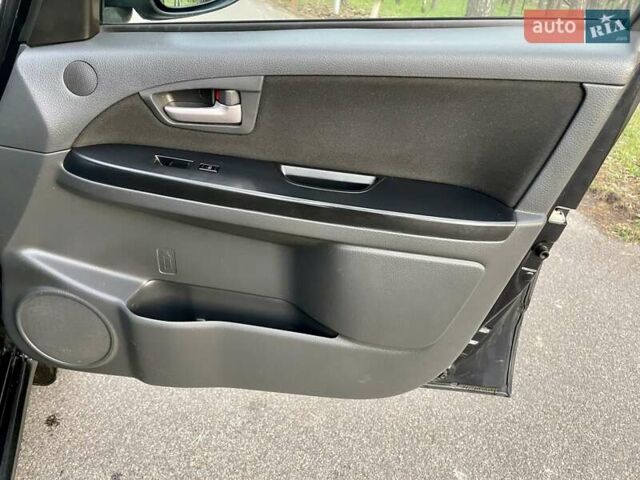 Черный Сузуки СХ4, объемом двигателя 2 л и пробегом 164 тыс. км за 7999 $, фото 31 на Automoto.ua