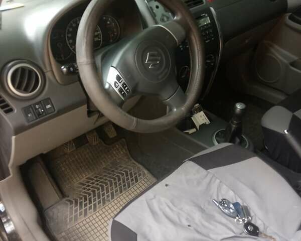 Черный Сузуки СХ4, объемом двигателя 1.6 л и пробегом 120 тыс. км за 6300 $, фото 5 на Automoto.ua