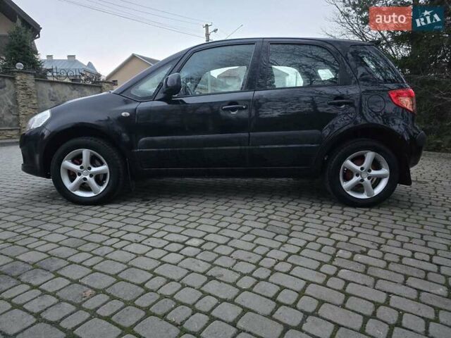 Черный Сузуки СХ4, объемом двигателя 1.6 л и пробегом 178 тыс. км за 5700 $, фото 10 на Automoto.ua