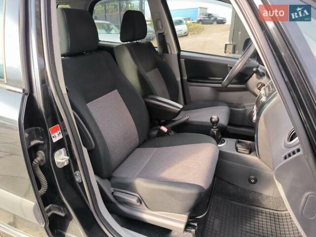 Чорний Сузукі СХ4, об'ємом двигуна 1.59 л та пробігом 137 тис. км за 7490 $, фото 11 на Automoto.ua