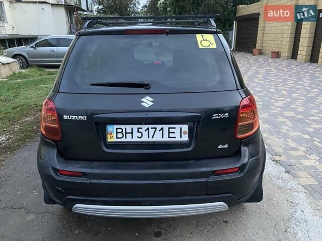 Черный Сузуки СХ4, объемом двигателя 1.6 л и пробегом 213 тыс. км за 6700 $, фото 4 на Automoto.ua
