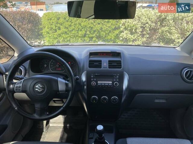 Черный Сузуки СХ4, объемом двигателя 1.6 л и пробегом 204 тыс. км за 6550 $, фото 8 на Automoto.ua
