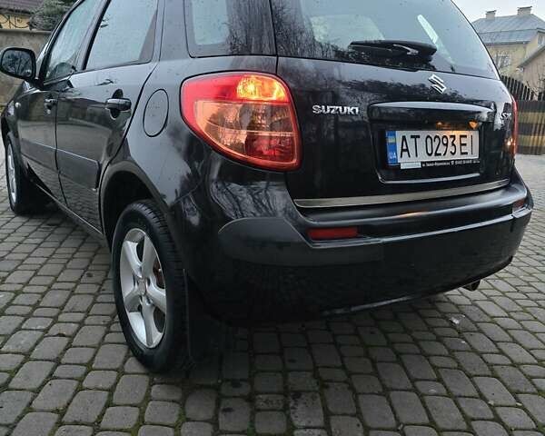 Черный Сузуки СХ4, объемом двигателя 1.6 л и пробегом 178 тыс. км за 5700 $, фото 6 на Automoto.ua