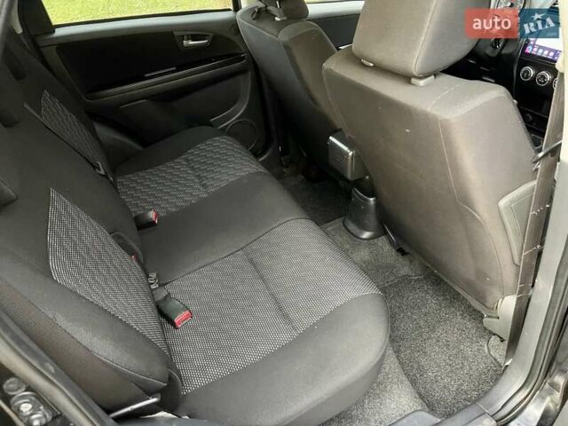 Черный Сузуки СХ4, объемом двигателя 2 л и пробегом 164 тыс. км за 7999 $, фото 19 на Automoto.ua