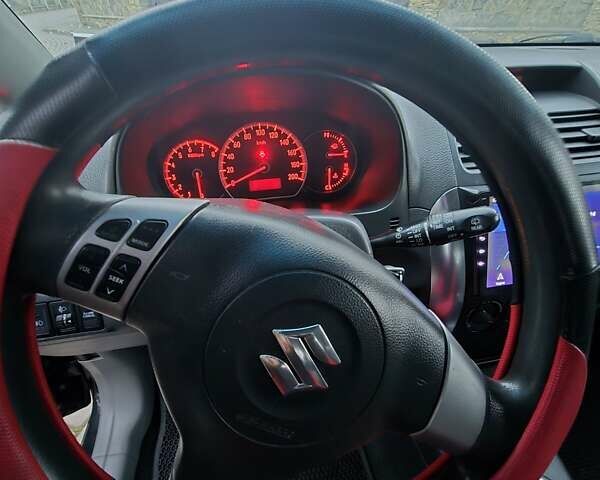 Черный Сузуки СХ4, объемом двигателя 1.6 л и пробегом 178 тыс. км за 5700 $, фото 31 на Automoto.ua