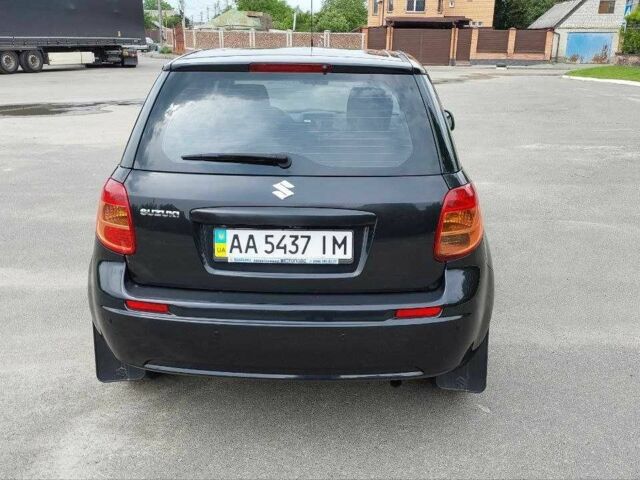 Черный Сузуки СХ4, объемом двигателя 1.6 л и пробегом 249 тыс. км за 6400 $, фото 4 на Automoto.ua