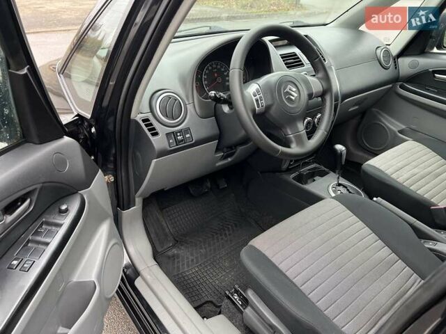 Черный Сузуки СХ4, объемом двигателя 1.59 л и пробегом 155 тыс. км за 7500 $, фото 8 на Automoto.ua