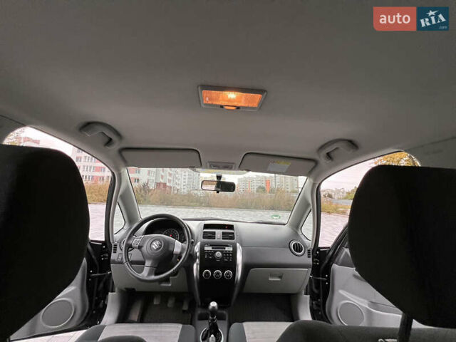 Чорний Сузукі СХ4, об'ємом двигуна 1.59 л та пробігом 67 тис. км за 6999 $, фото 35 на Automoto.ua