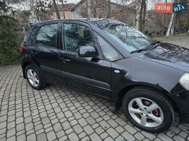 Черный Сузуки СХ4, объемом двигателя 1.6 л и пробегом 178 тыс. км за 5700 $, фото 3 на Automoto.ua