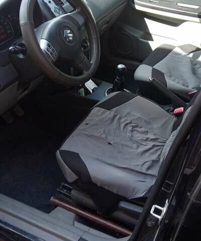 Черный Сузуки СХ4, объемом двигателя 1.6 л и пробегом 120 тыс. км за 6300 $, фото 9 на Automoto.ua