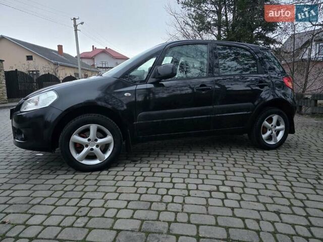 Черный Сузуки СХ4, объемом двигателя 1.6 л и пробегом 178 тыс. км за 5700 $, фото 8 на Automoto.ua