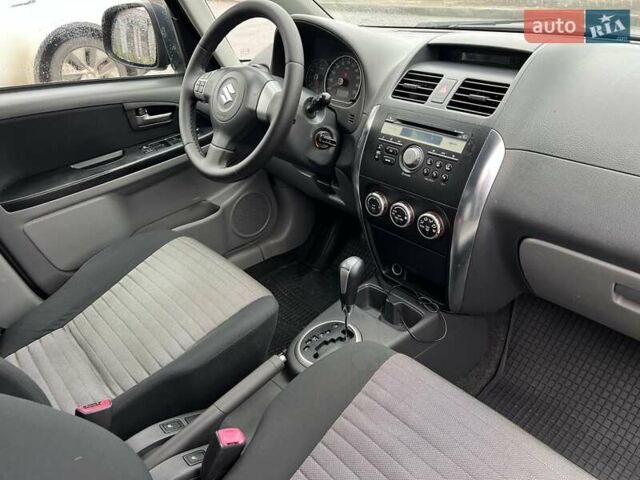 Черный Сузуки СХ4, объемом двигателя 1.59 л и пробегом 155 тыс. км за 7500 $, фото 7 на Automoto.ua