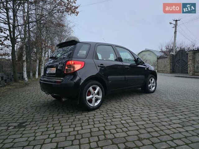 Черный Сузуки СХ4, объемом двигателя 1.6 л и пробегом 178 тыс. км за 5700 $, фото 14 на Automoto.ua