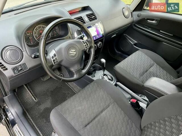 Черный Сузуки СХ4, объемом двигателя 2 л и пробегом 164 тыс. км за 7999 $, фото 11 на Automoto.ua