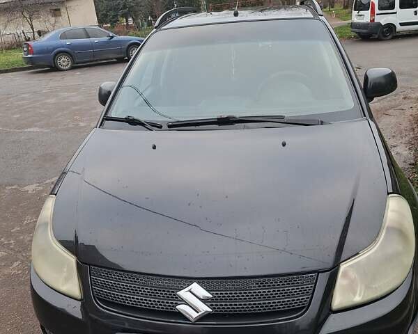 Чорний Сузукі СХ4, об'ємом двигуна 1.59 л та пробігом 265 тис. км за 6500 $, фото 1 на Automoto.ua